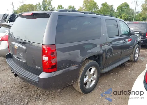 2010 Chevrolet Suburban 1500 Lt1 из США, поврежденный, VIN 1GNUKJE37AR143553